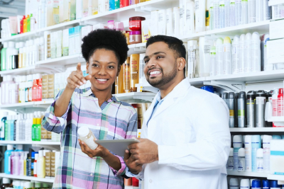 woman and a pharmacist looking at something
